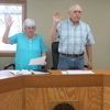 Sherri Borden is sworn in as counci member and Dave Engroff is sworn as Greenfield City Mayor. (photo by Bob Jackson)