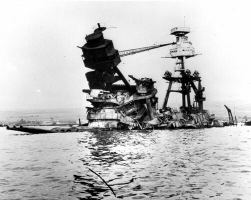 The wreck of the USS Arizona, after fires aboard were extinguished several days after the Dec. 7 attack. (U.S. Navy photograph)