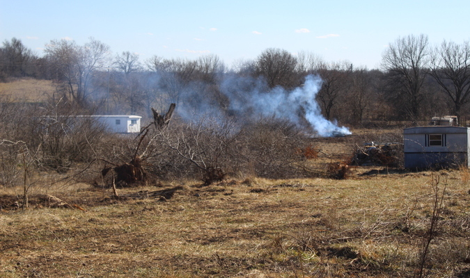 Ongoing cleanup at old dump site just south of Greenfield.  (Photo by Bob Jackson