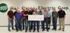 The Sac Osage Electric co-op board accepts a check for ARPA funding from the St. Clair County Commission. The funds will go to construct the co-op’s fiber optic broadband network in that county, freeing up funds for expansion other counties, such as Dade. (Photo courtesy Sac Osage Electric)